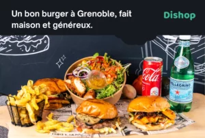 Un bon burger à Grenoble, accompagné de frites maison, salade fraîche et boisson, préparé avec des ingrédients frais et généreux.